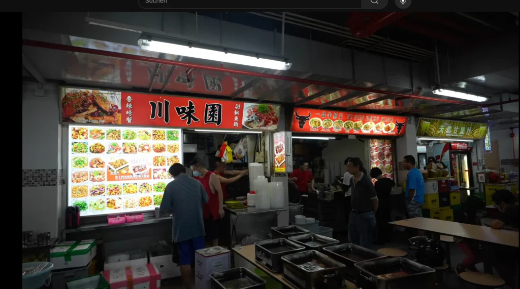 Streetfood Center in Chinatown Singapur mit einem Stand