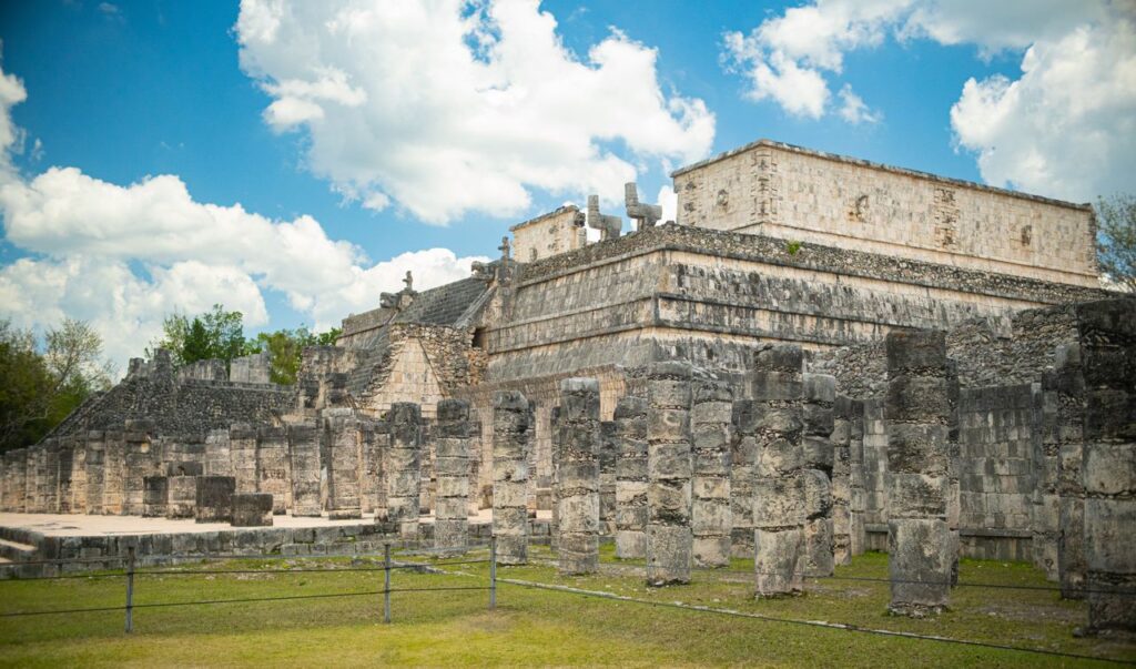 Explore the historic Warrior's Temple at Chichén Itzá, iconic Mayan ruins in Mexico.